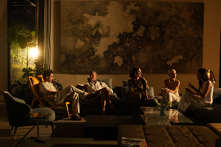 Residents gathered in a lounge in the evening