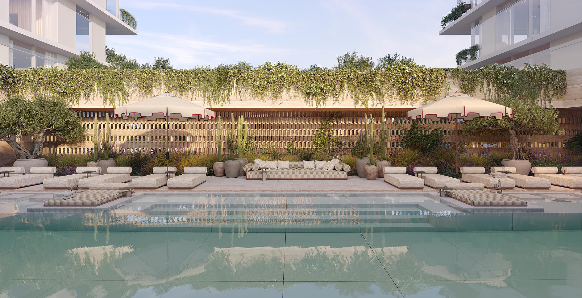 A rendering of the pool terrace with sun loungers, umbrellas and a planted wall