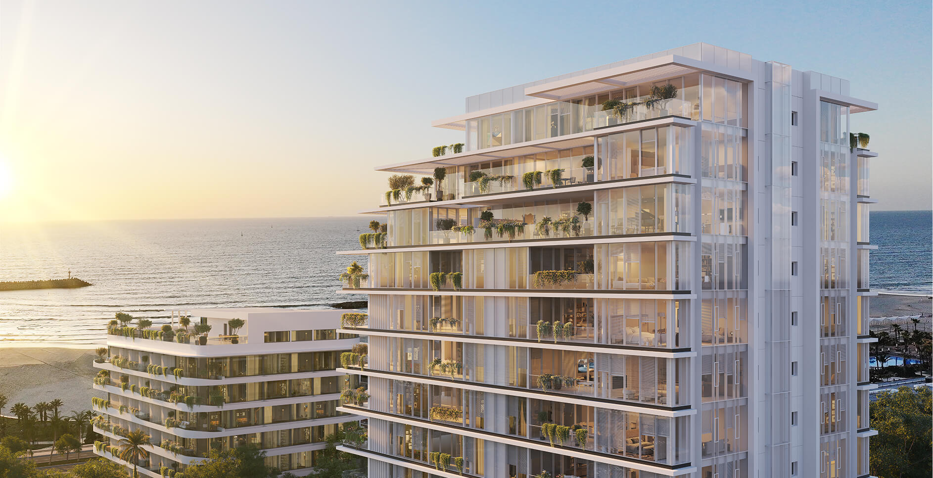A rendering of the Sea House tower at sunset, overlooking the beach