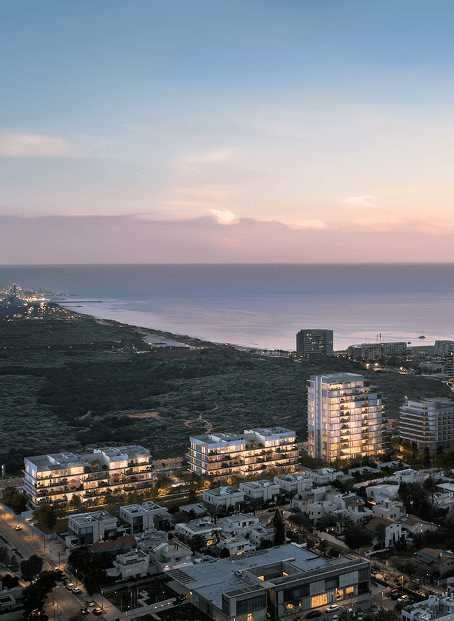 An aerial rendering of Pituach by the Sea at dusk, with the marina and the coastline behind